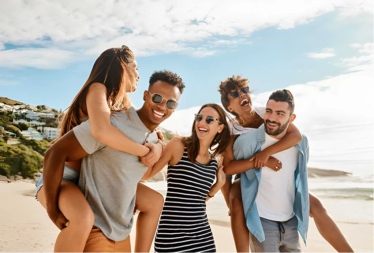 Friends together on a beach